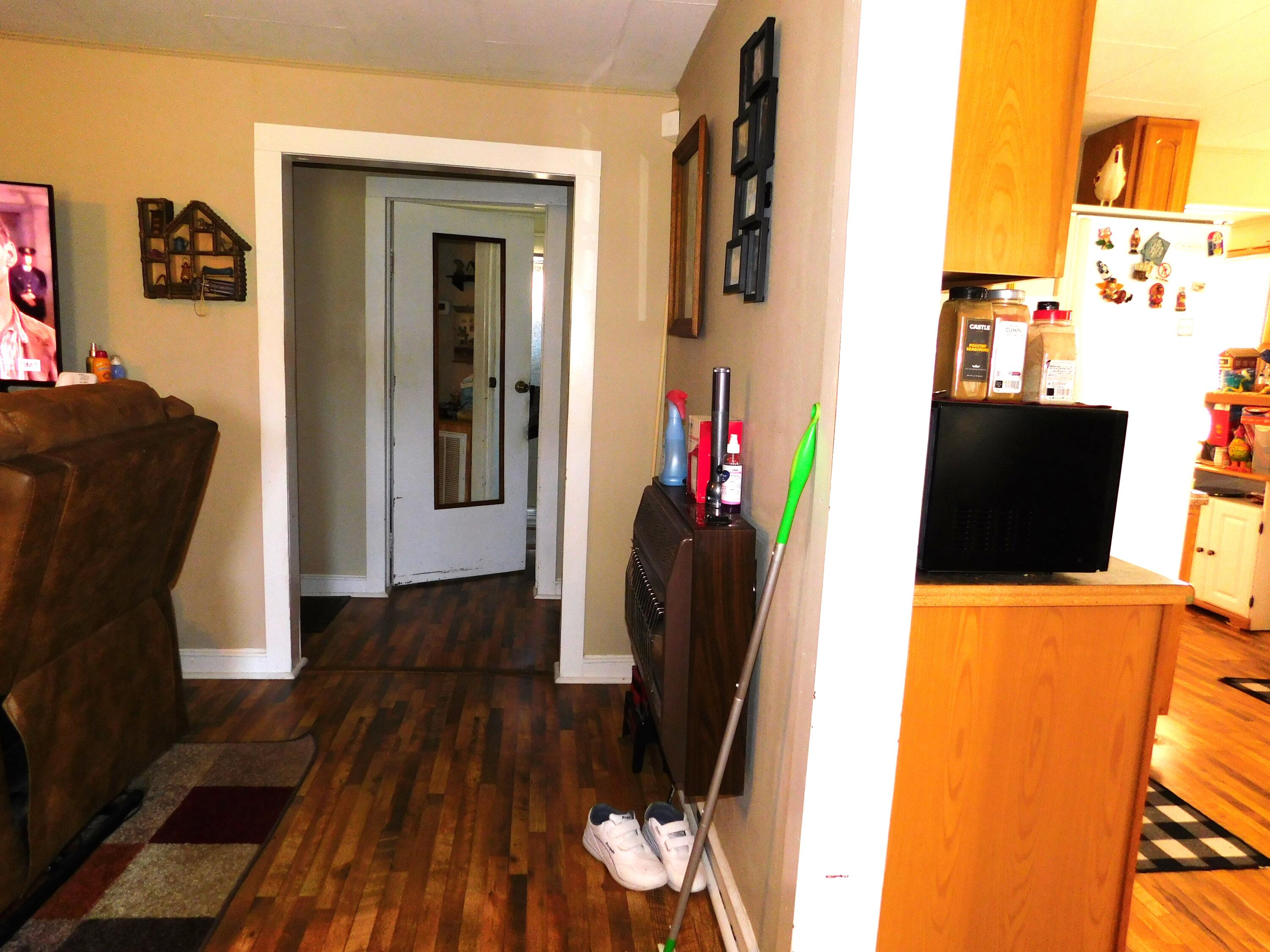2592 Dungannon Road Coeburn, VA 24230 - Photo 13 of 27 LIVING ROOM TOWARD KITCHEN AND BATH
