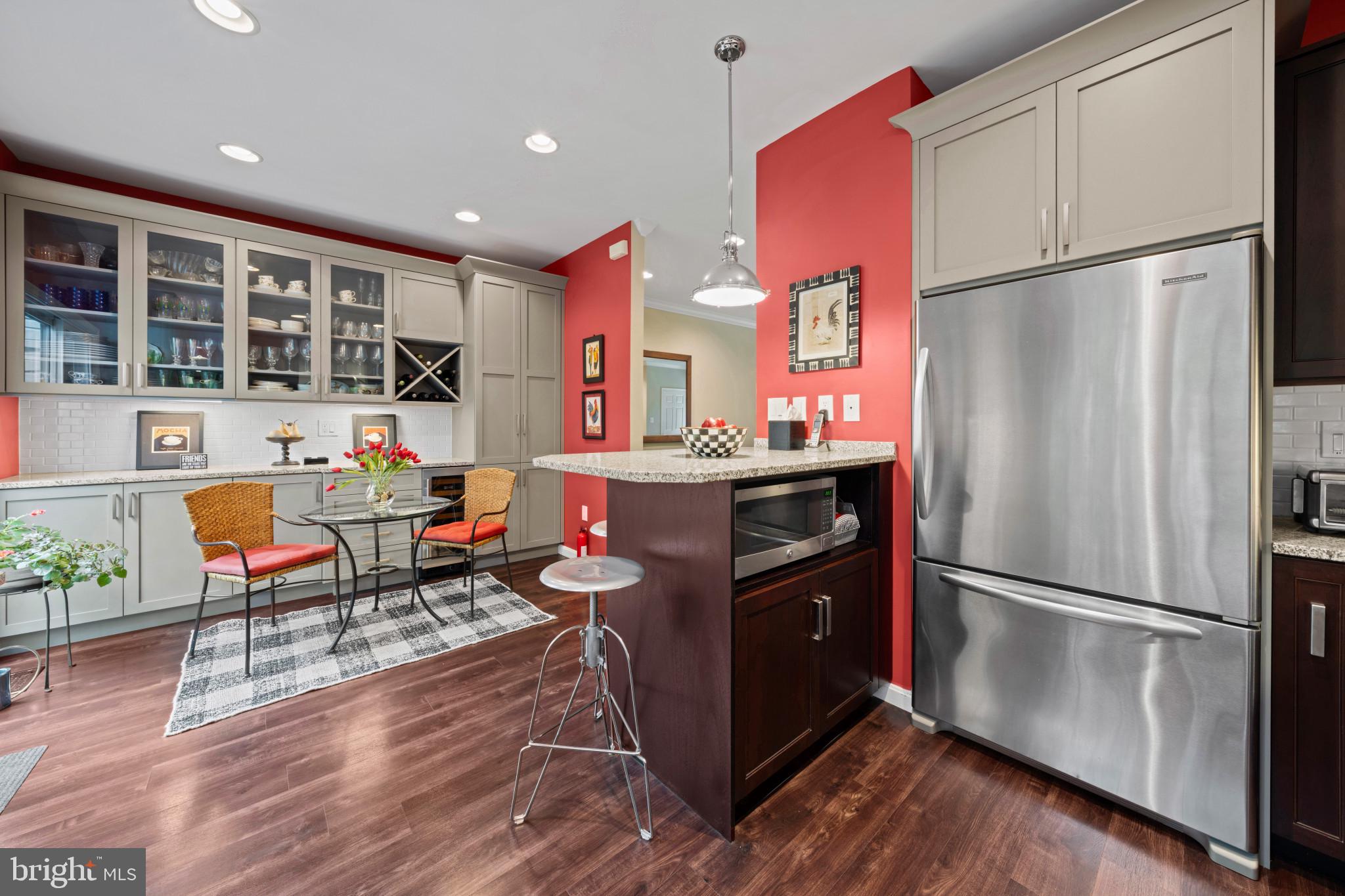 21980 Box Car Square Sterling, VA 20166 - Photo 6 of 36 Gorgeous Cabinetry, Island & Eat-In Space!