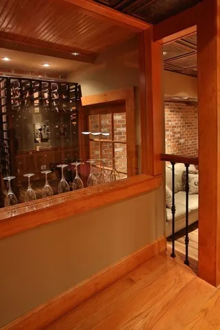 a room with wooden floor and furniture