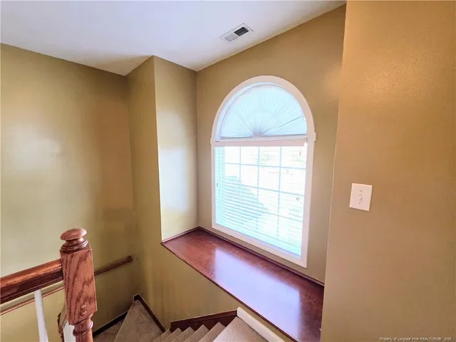 a view of a room with a window