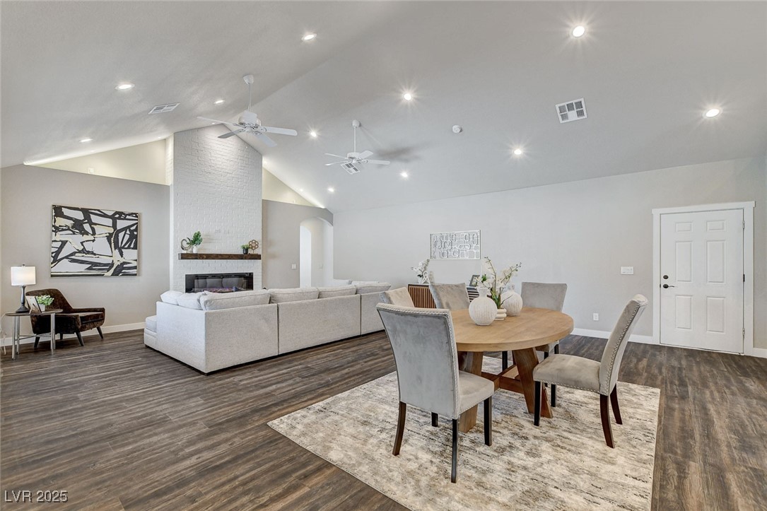 3196 Mateuse Street Logandale, NV 89021 - Photo 14 of 85 Dining area with a large fireplace, visible vents,