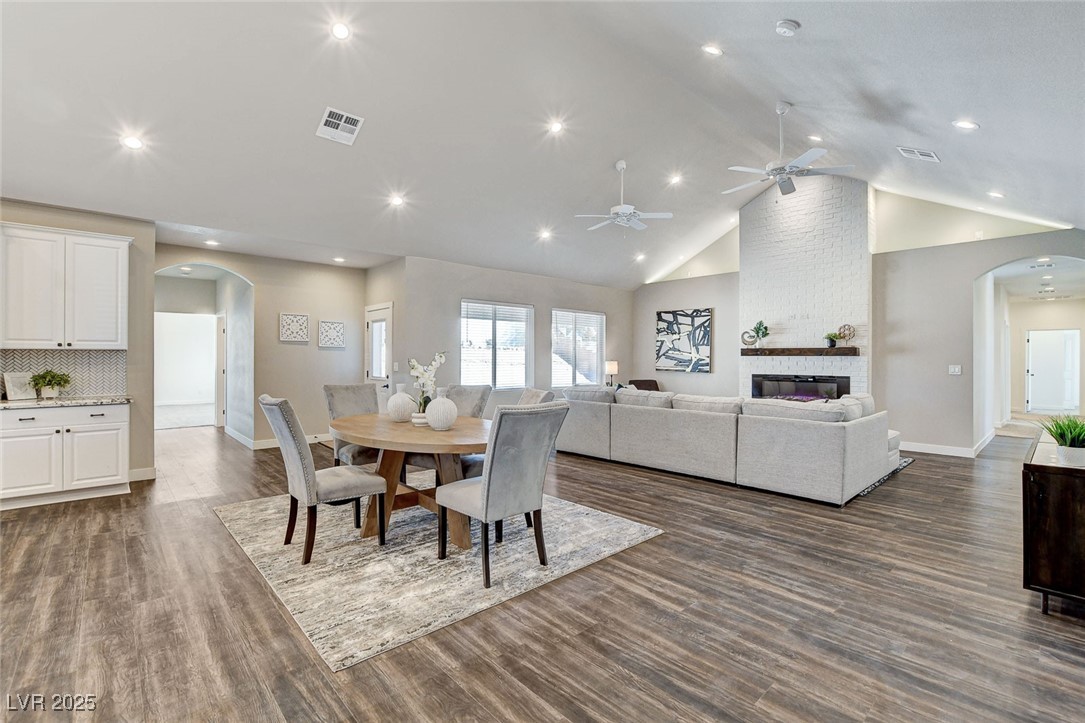 3196 Mateuse Street Logandale, NV 89021 - Photo 15 of 85 Dining room with lots of light, a fireplace, arche