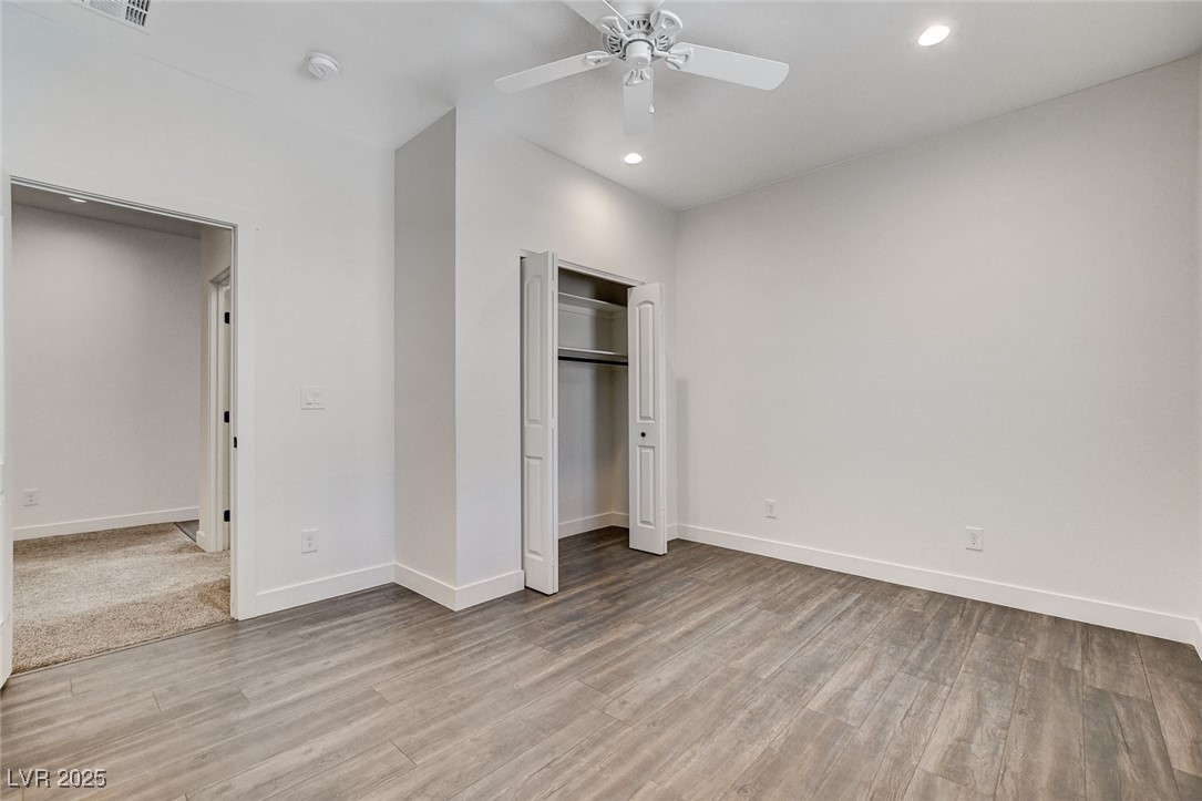 3196 Mateuse Street Logandale, NV 89021 - Photo 30 of 85 Bedroom 3 with recessed lighting, a closet, basebo