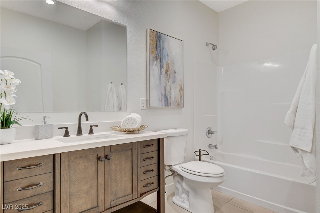 3196 Mateuse Street Logandale, NV 89021 - Photo 40 of 85 Bathroom featuring tile patterned flooring, shower