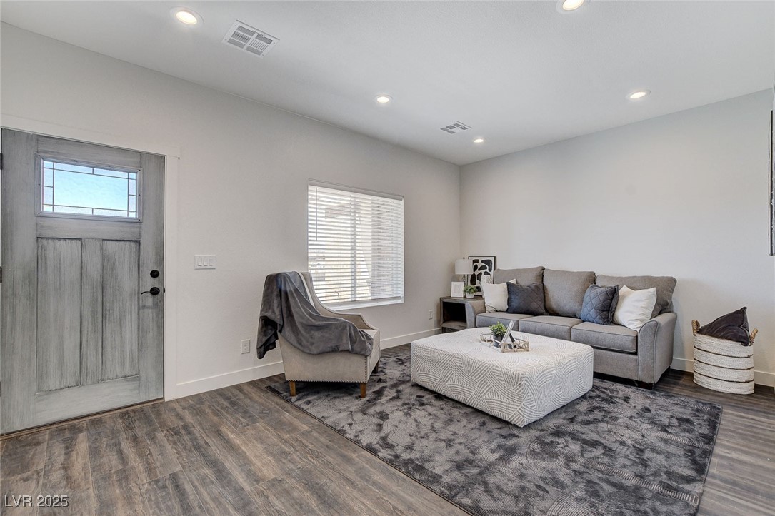 3196 Mateuse Street Logandale, NV 89021 - Photo 51 of 85 Formal living room featuring woodlike laminate fin