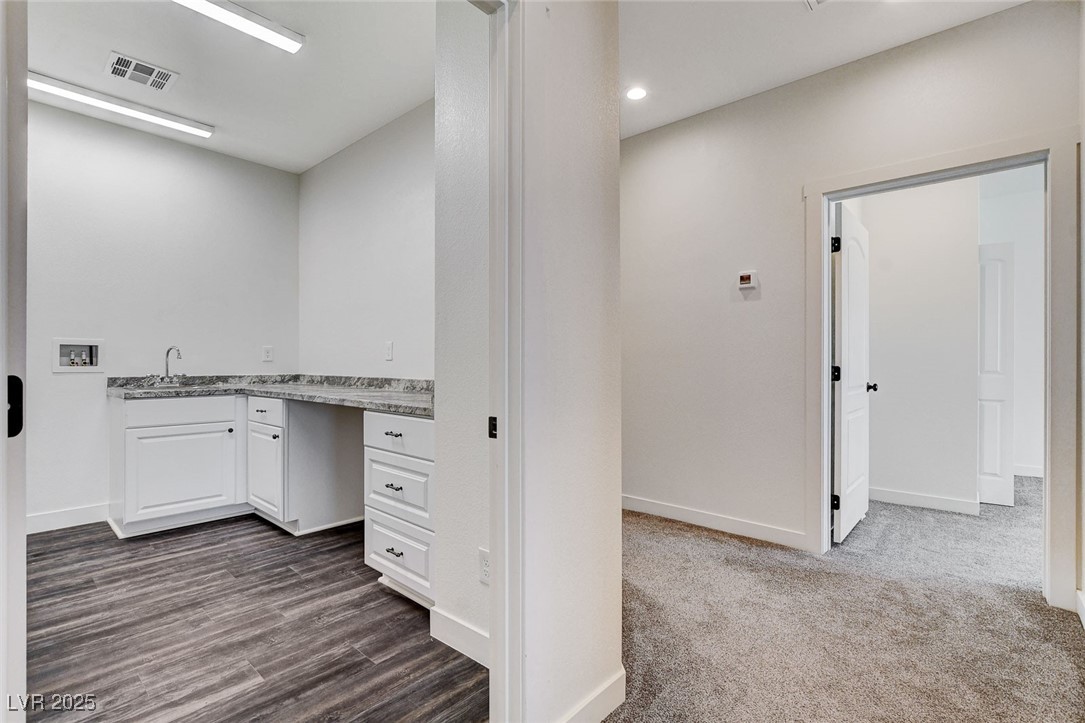 3196 Mateuse Street Logandale, NV 89021 - Photo 57 of 85 Seperate laundry room, a sink, and baseboards