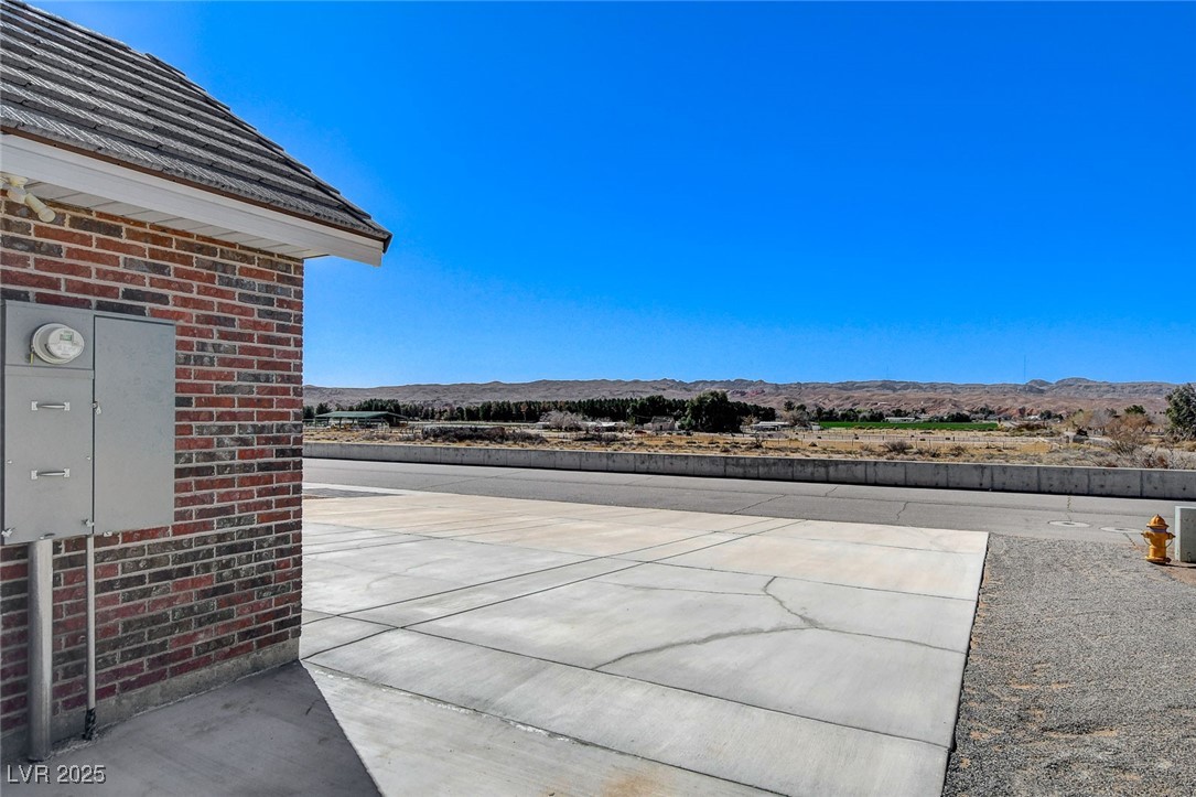 3196 Mateuse Street Logandale, NV 89021 - Photo 60 of 85 View of patio / terrace with a mountain view