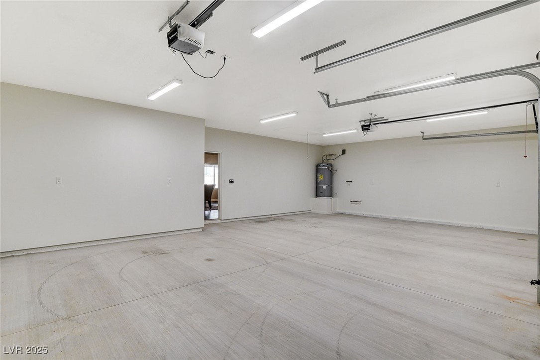 3196 Mateuse Street Logandale, NV 89021 - Photo 61 of 85 Garage with a garage door opener and secured water