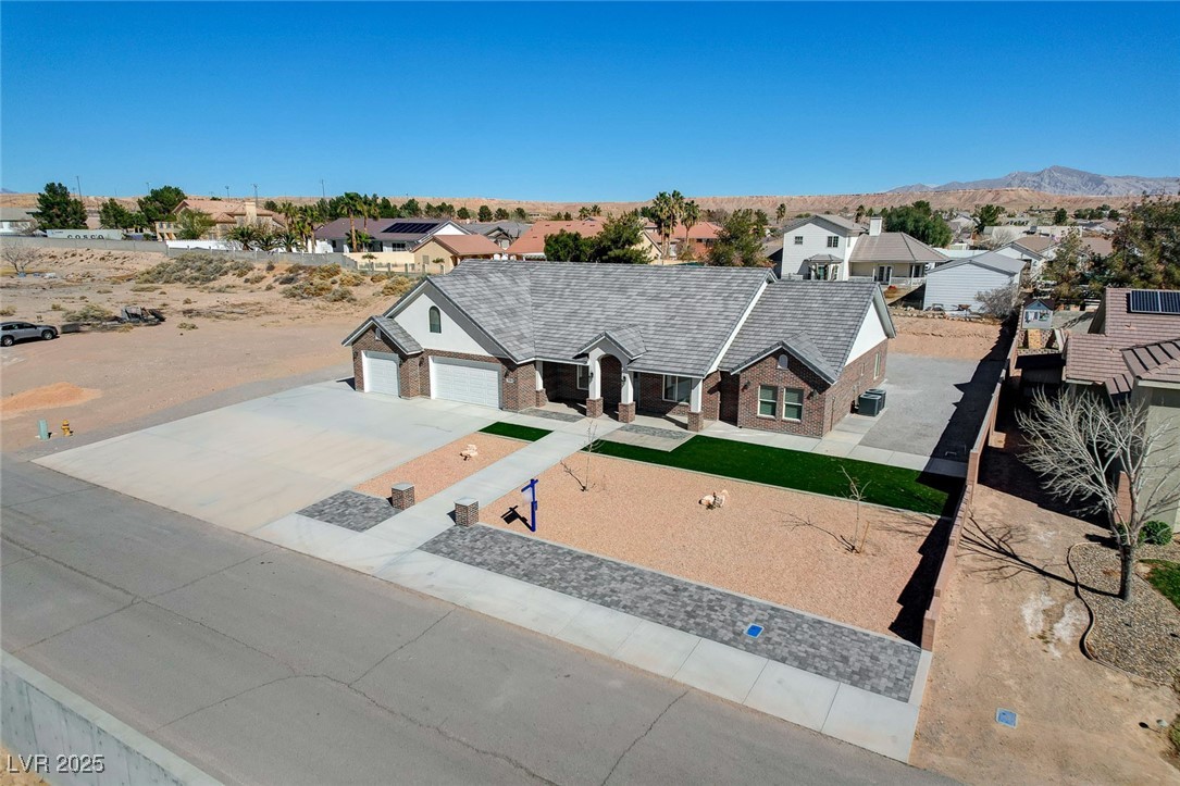 3196 Mateuse Street Logandale, NV 89021 - Photo 65 of 85 View of front featuring a residential view, concre