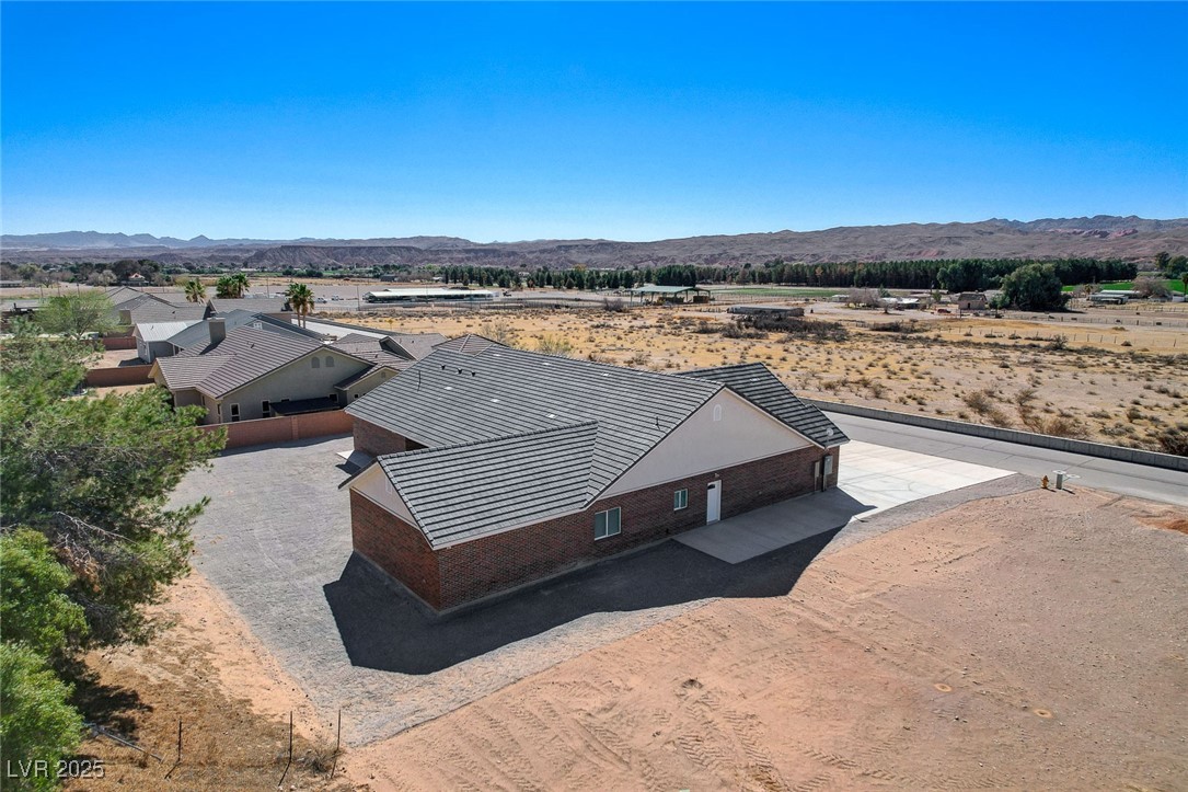 3196 Mateuse Street Logandale, NV 89021 - Photo 68 of 85 Drone / aerial view featuring a mesa view