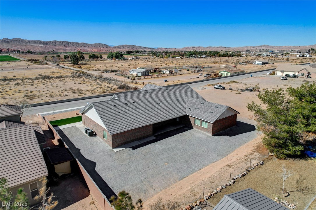 3196 Mateuse Street Logandale, NV 89021 - Photo 70 of 85 Aerial view with a desert view and a mesa view