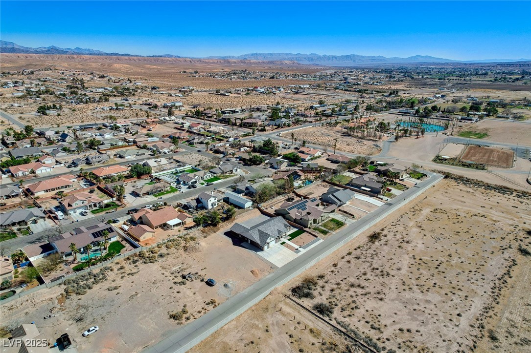 3196 Mateuse Street Logandale, NV 89021 - Photo 78 of 85 Bird's eye view with a desert view and a mountain