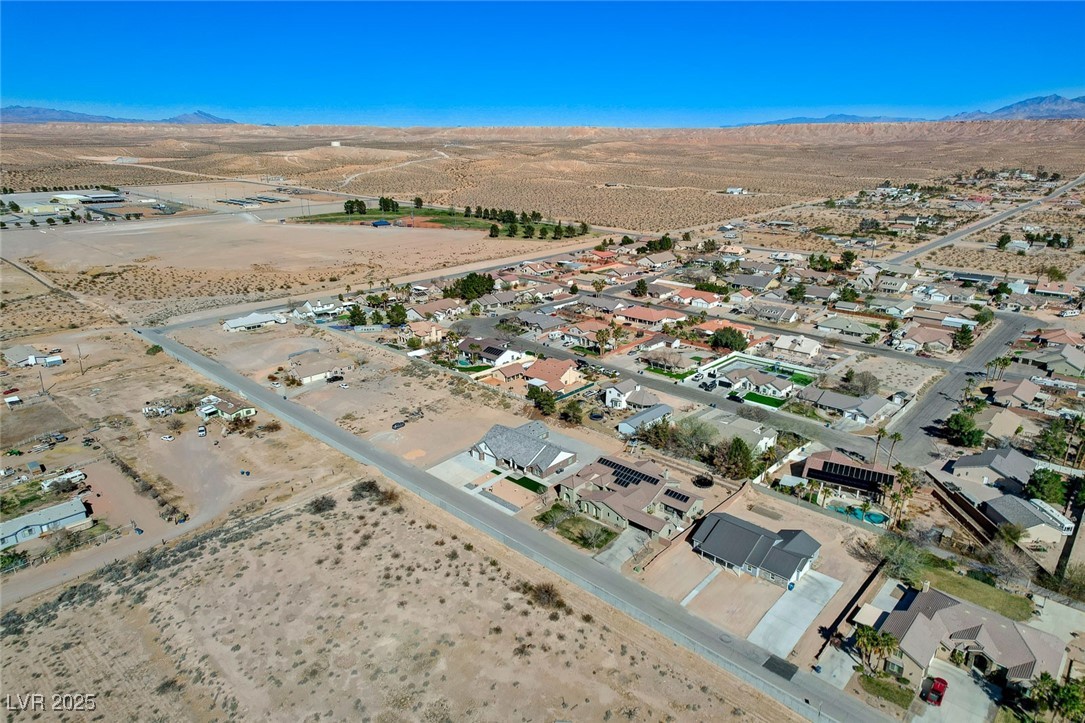 3196 Mateuse Street Logandale, NV 89021 - Photo 79 of 85 Bird's eye view with view of desert and a mountain