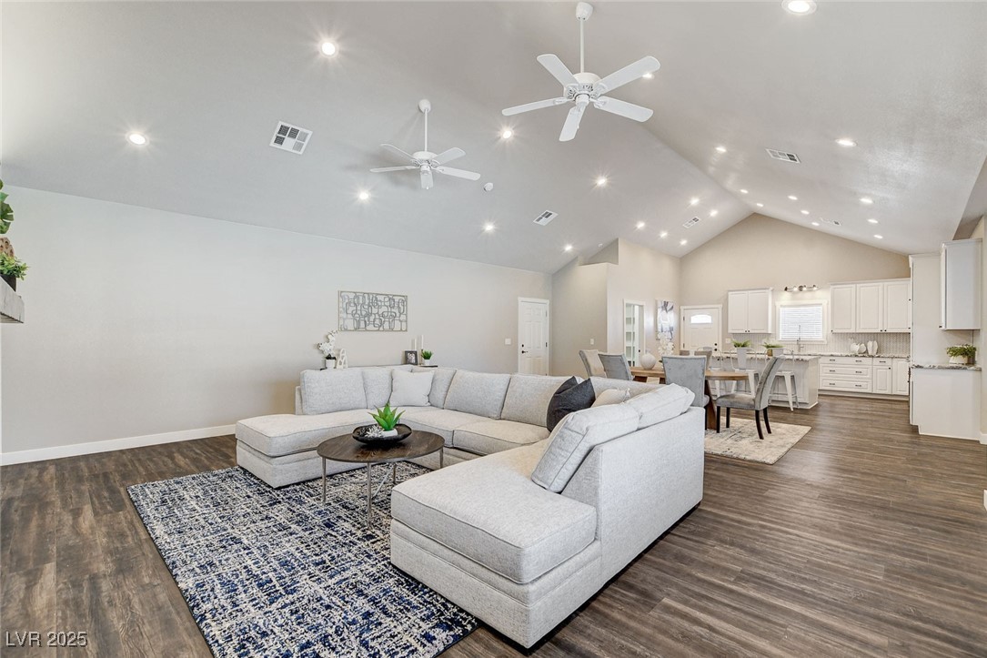 3196 Mateuse Street Logandale, NV 89021 - Photo 9 of 85 Living room with ceiling fan, dark wood-type lamin