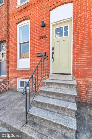 a view of a house with stairs and wooden floor