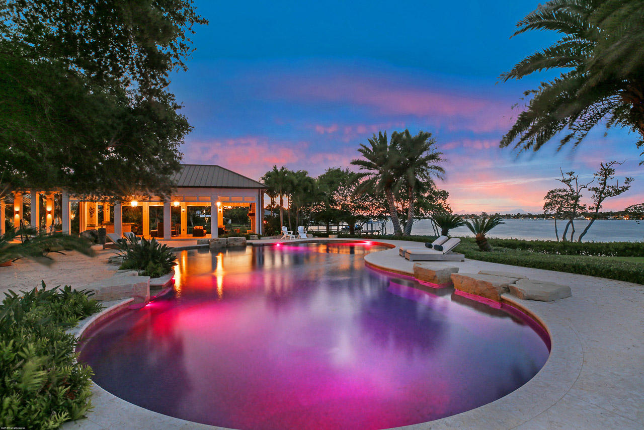 5241 Pennock Point Road Jupiter, FL 33458 - Photo 26 of 51 Pool and Loggia at Sunset