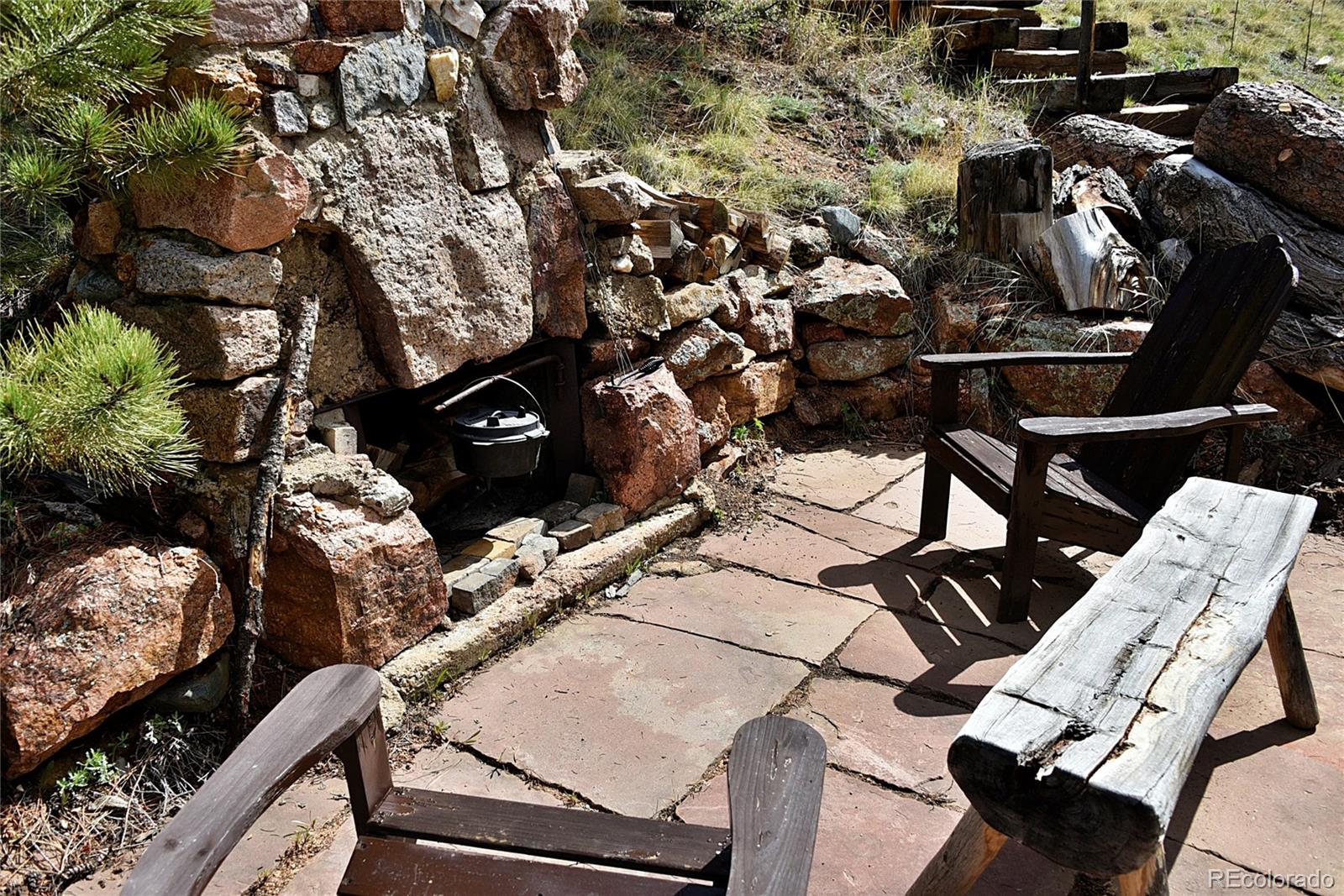 60 Ball Road Bailey, CO 80421 - Photo 28 of 37 a view of a terrace with chairs