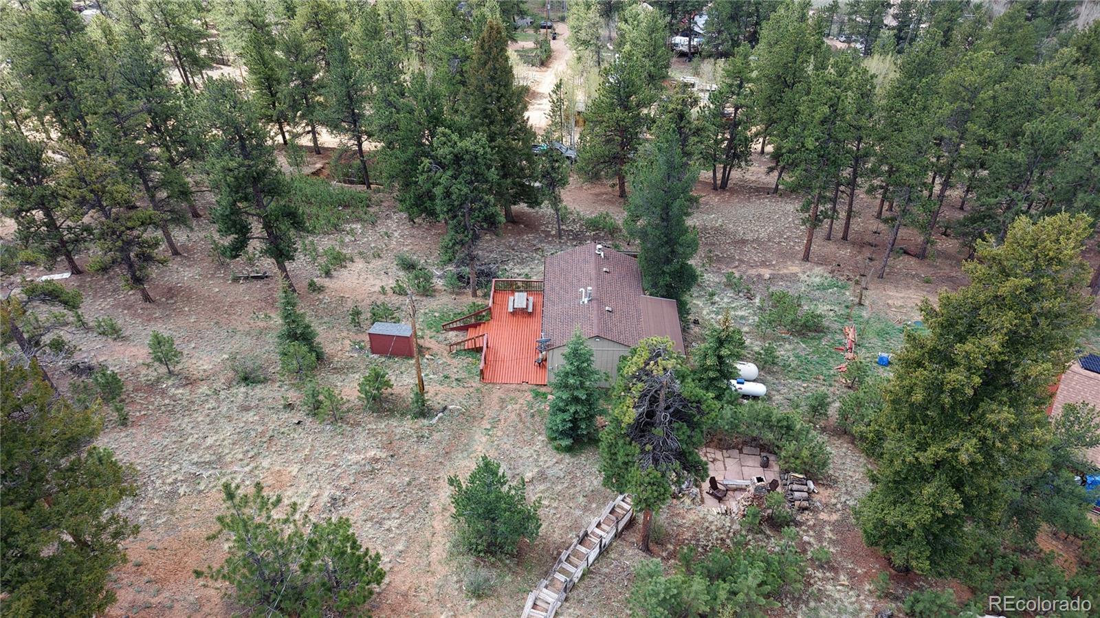 60 Ball Road Bailey, CO 80421 - Photo 34 of 37 an aerial view of a house with a yard