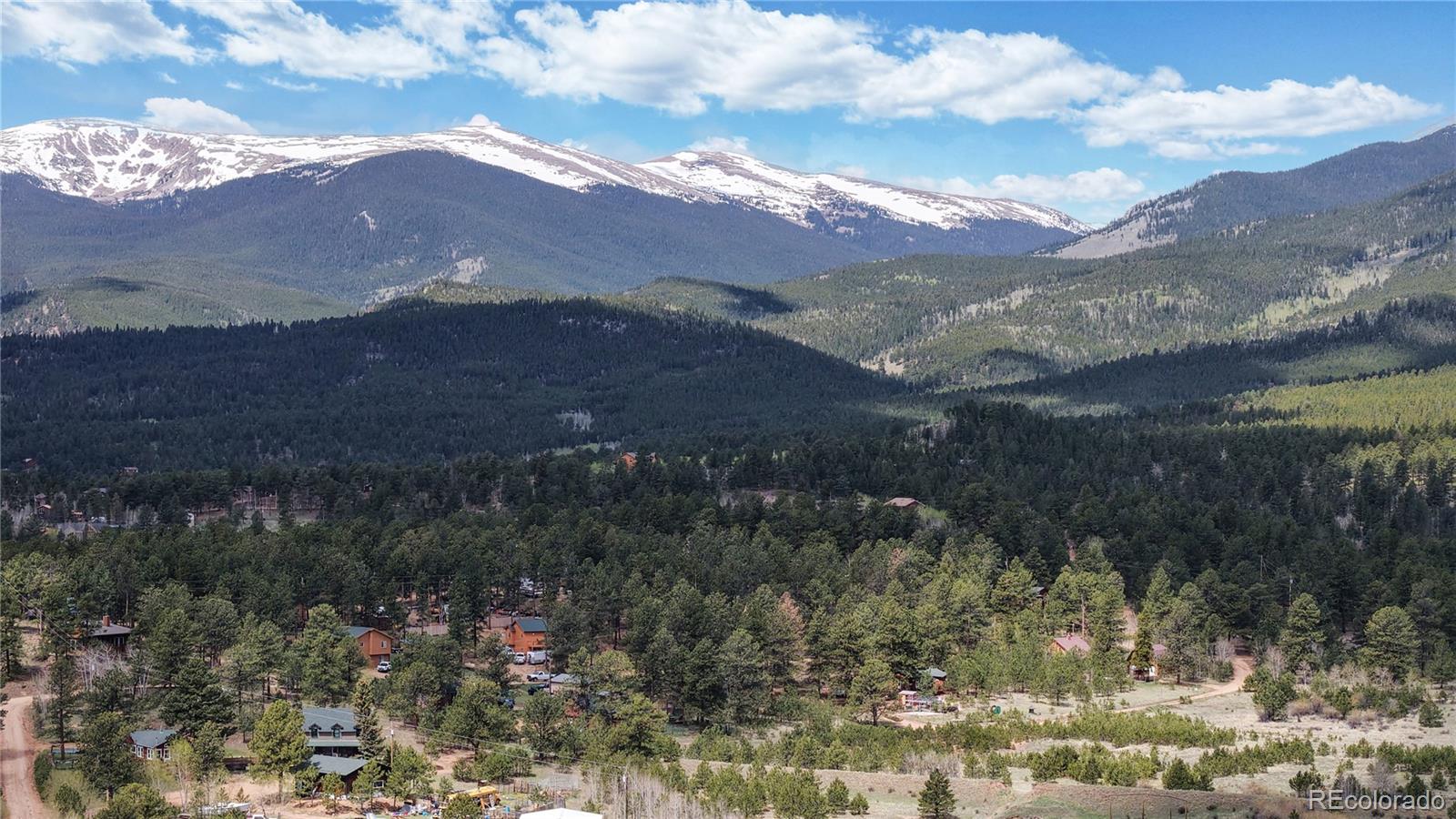 60 Ball Road Bailey, CO 80421 - Photo 37 of 37 a view of a town with mountains in the background