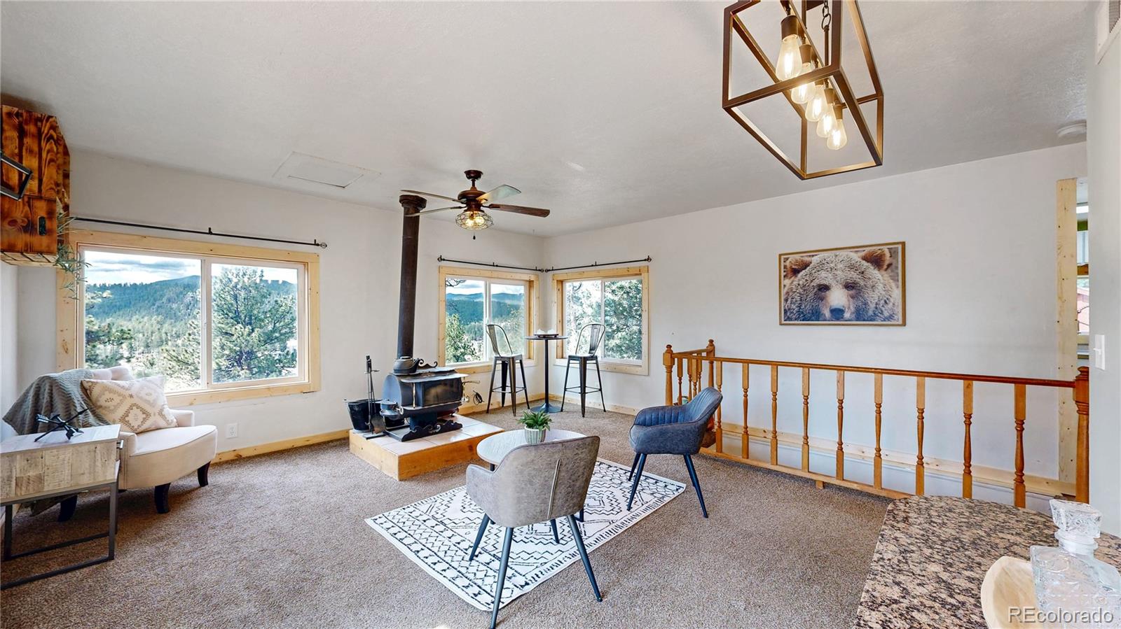 60 Ball Road Bailey, CO 80421 - Photo 10 of 37 a living room with furniture and a large window
