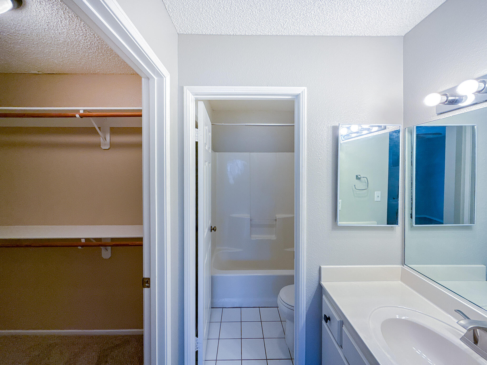 43840 Bobby Jones Drive, Unit 24 Lancaster, CA 93536 - Photo 17 of 29 a bathroom with a sink a toilet and shower