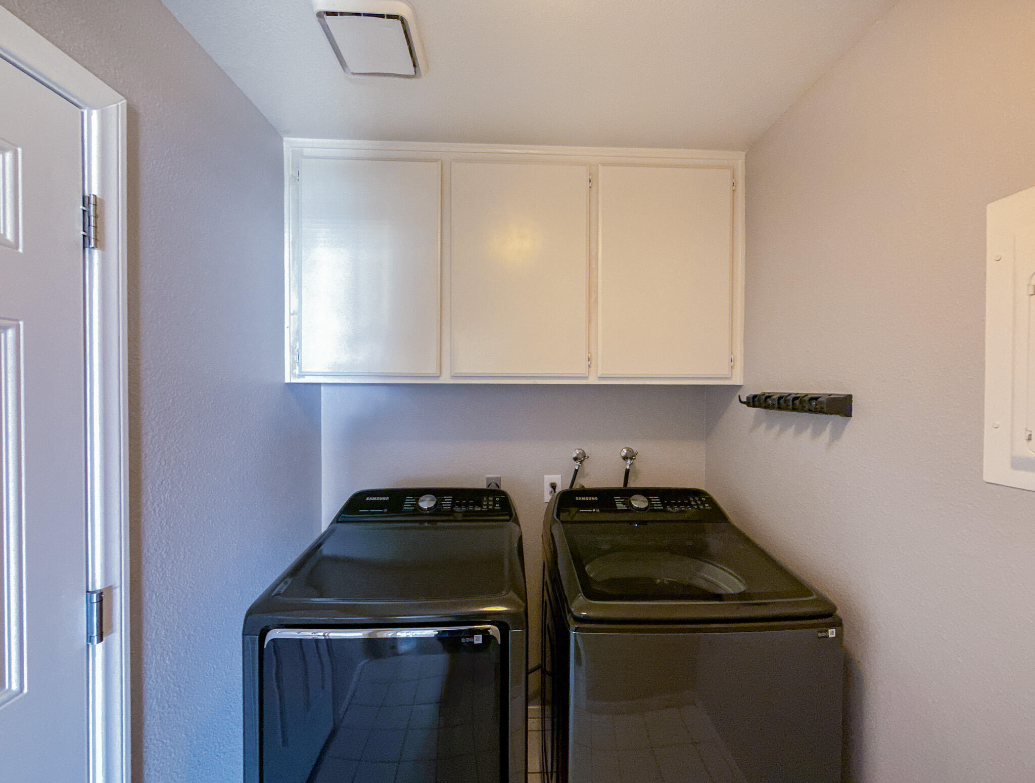 43840 Bobby Jones Drive, Unit 24 Lancaster, CA 93536 - Photo 25 of 29 a kitchen with a sink a stove and cabinets