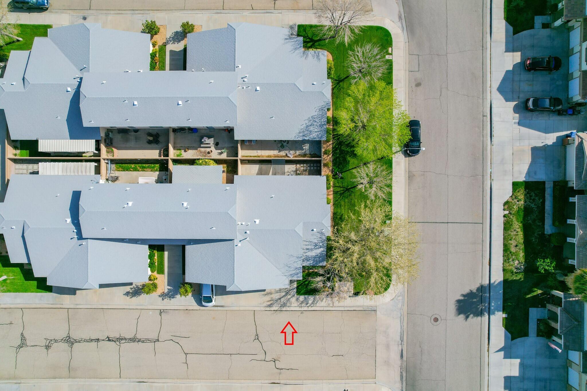 43840 Bobby Jones Drive, Unit 24 Lancaster, CA 93536 - Photo 27 of 29 an aerial view of multiple houses with a yard