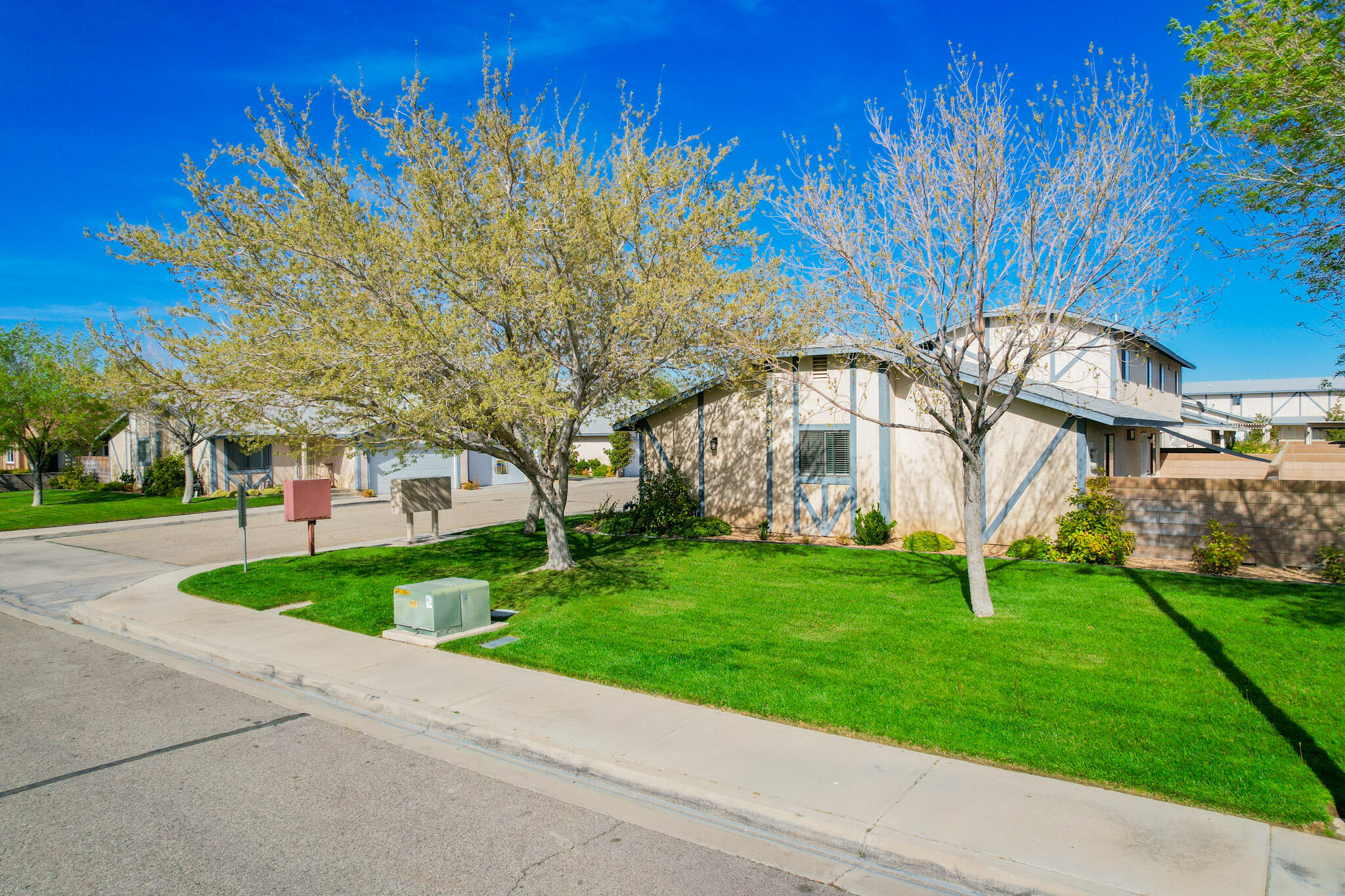 43840 Bobby Jones Drive, Unit 24 Lancaster, CA 93536 - Photo 7 of 29 a view of a house with a yard