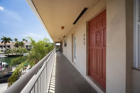 a view of balcony and yard