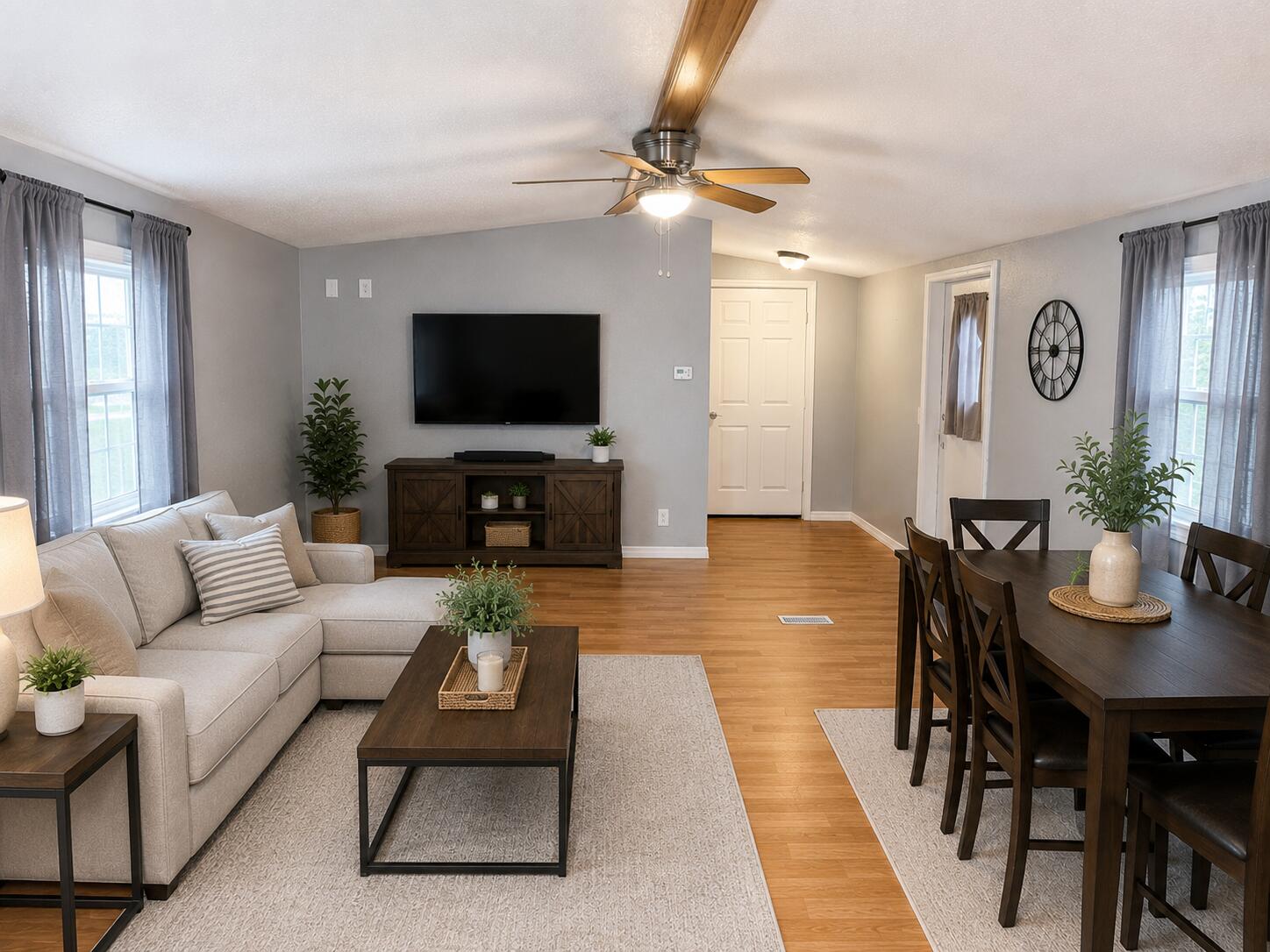 2547 Chatham Way Northeast Palm Bay, FL 32905 - Photo 18 of 24 a living room with furniture and a flat screen tv