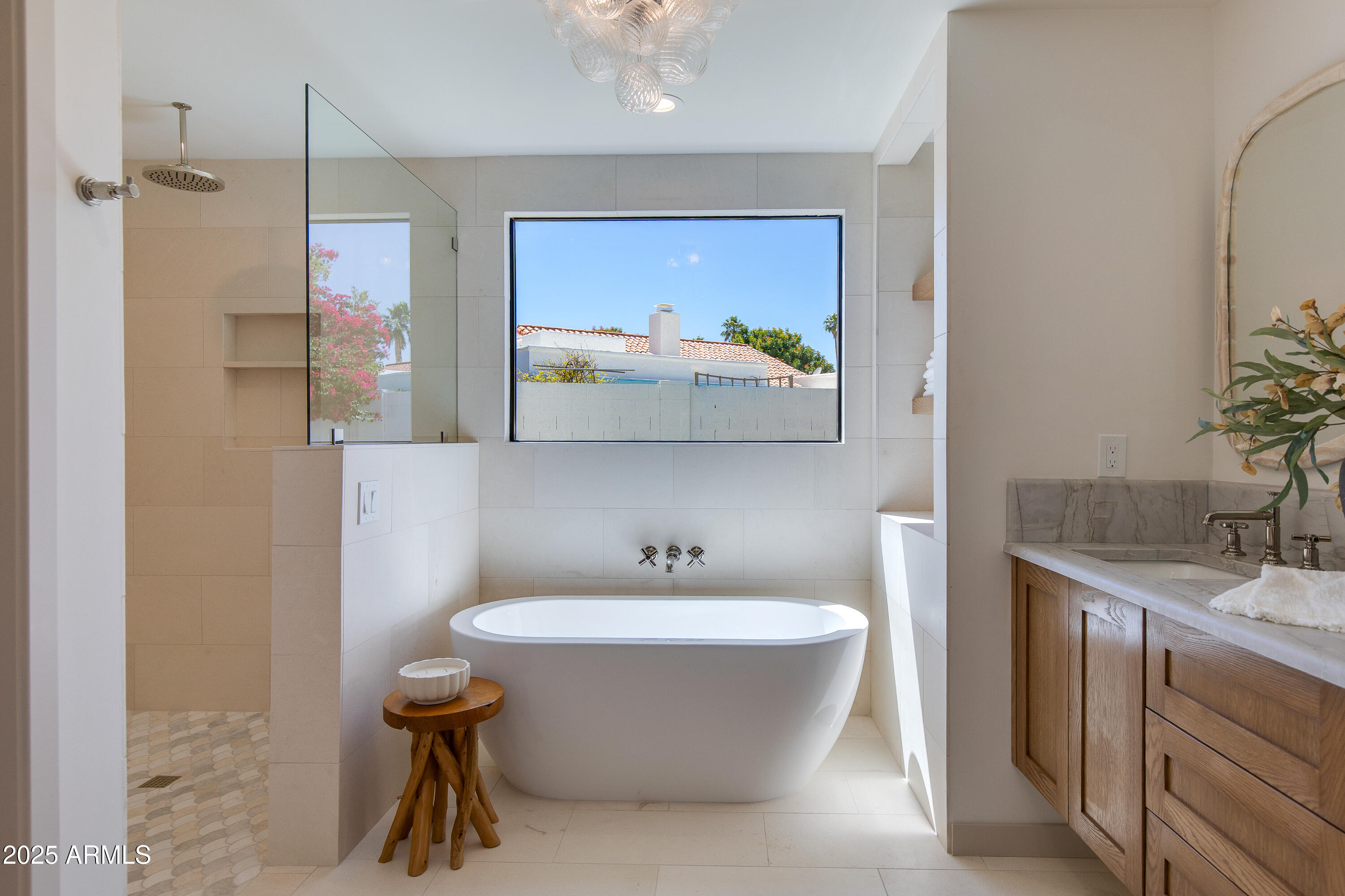 7328 East Laredo Lane Scottsdale, AZ 85250 - Photo 15 of 27 a bathroom with a sink and a mirror