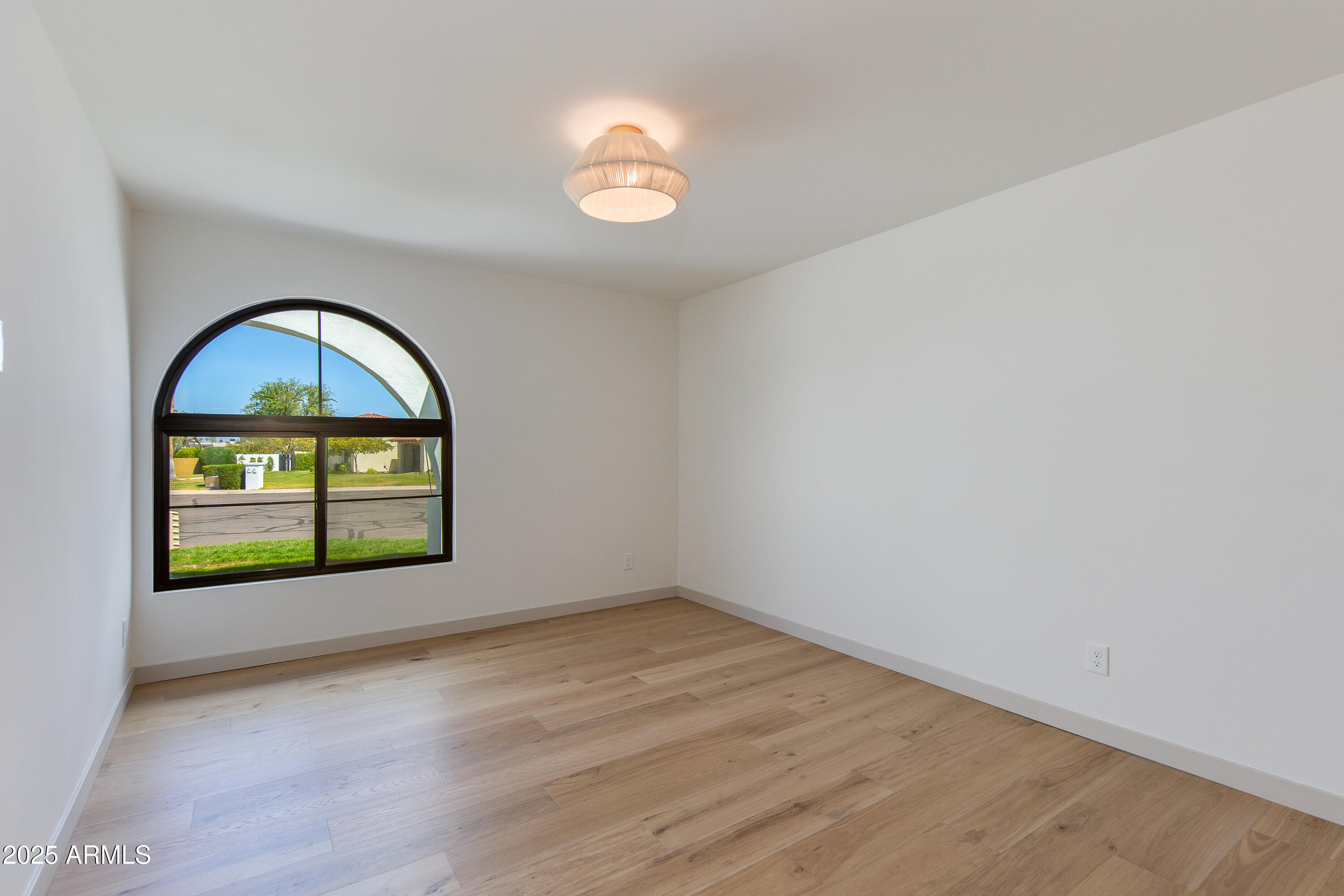 7328 East Laredo Lane Scottsdale, AZ 85250 - Photo 16 of 27 a view of empty room with window