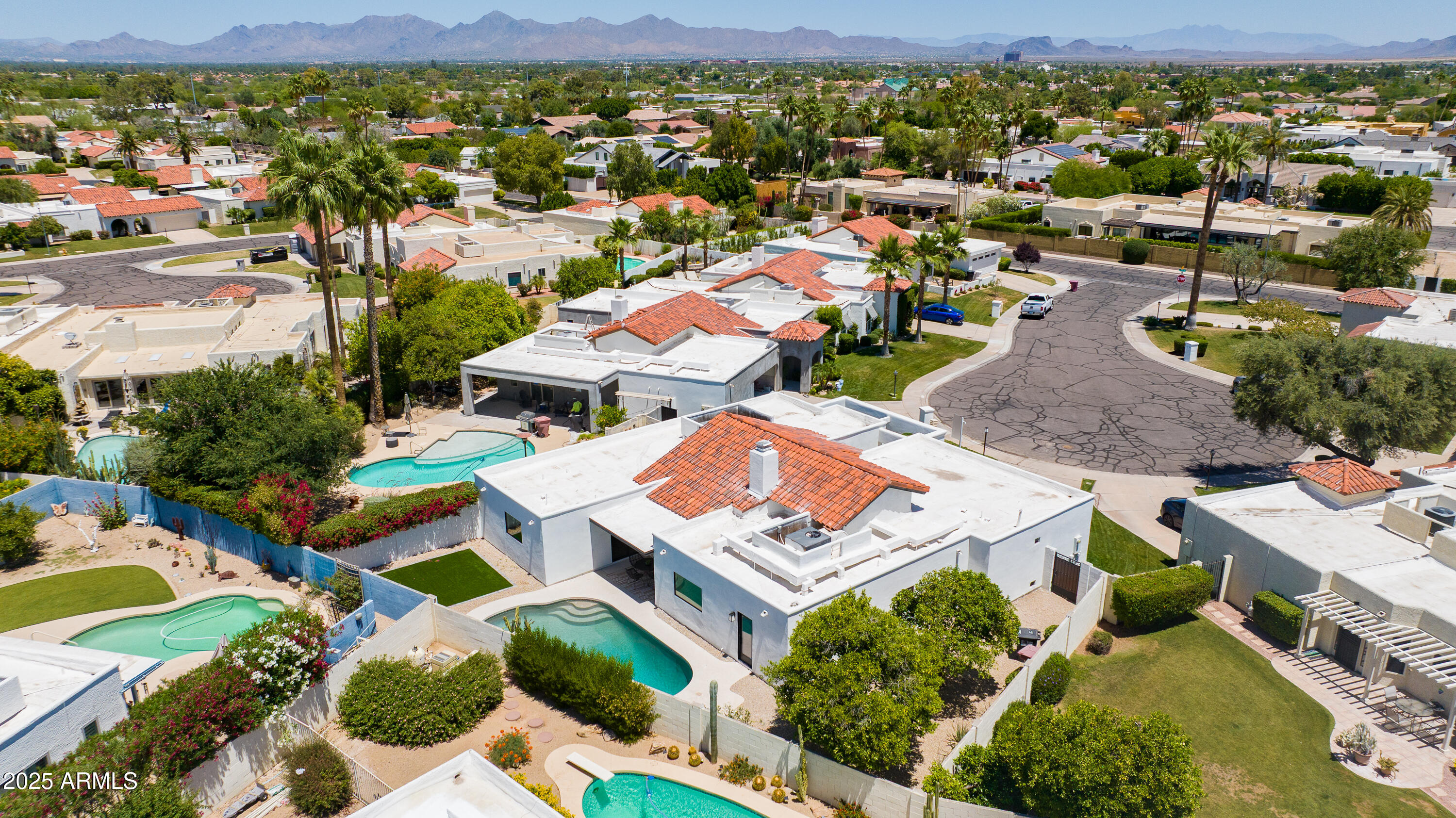 7328 East Laredo Lane Scottsdale, AZ 85250 - Photo 25 of 27 an aerial view of residential houses with outdoor space
