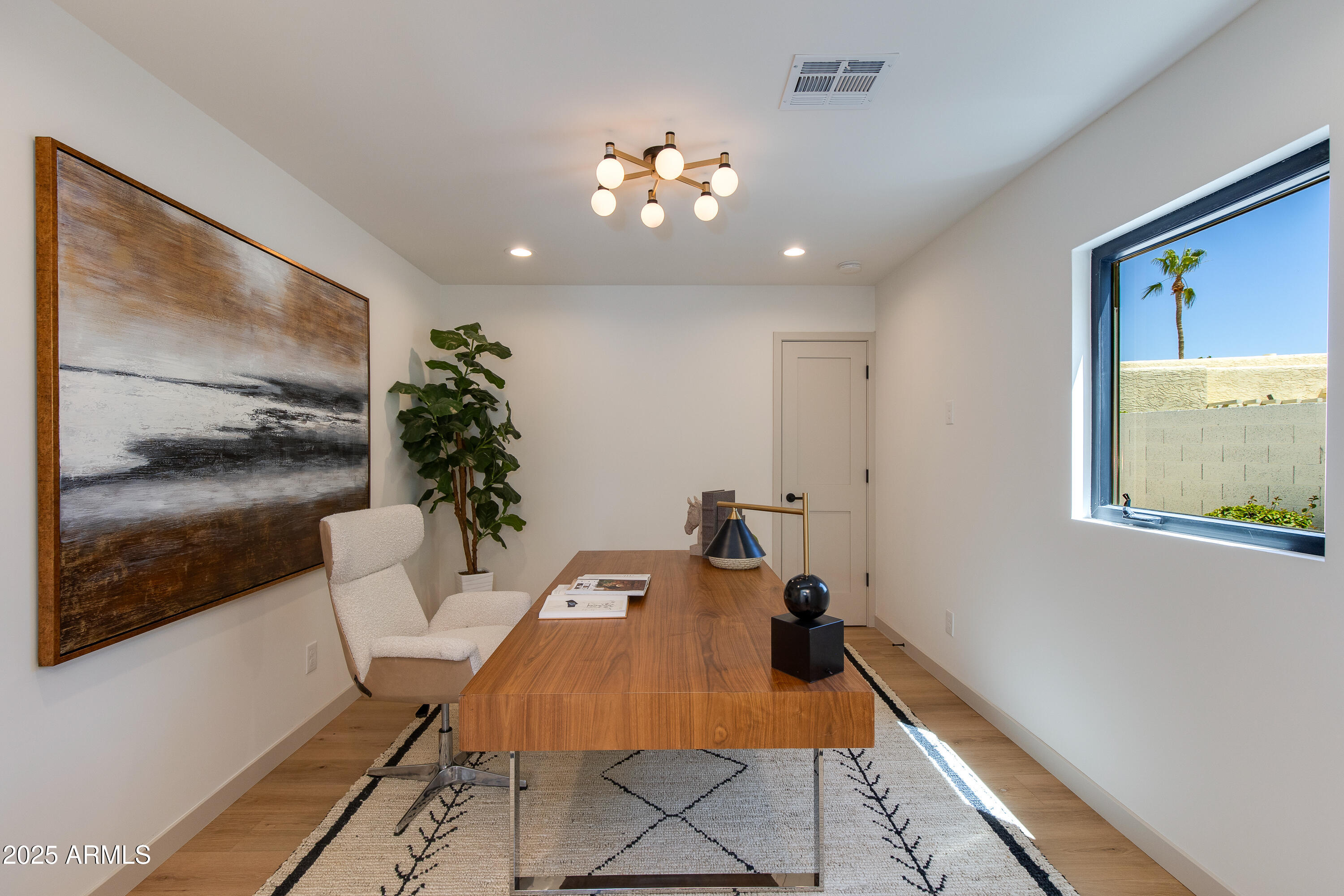 7328 East Laredo Lane Scottsdale, AZ 85250 - Photo 10 of 27 a very nice looking dining room with a large window