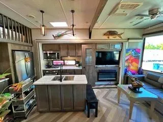 a room with furniture and flat screen tv