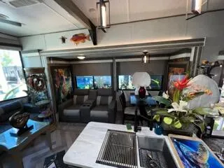 a room with furniture and a chandelier