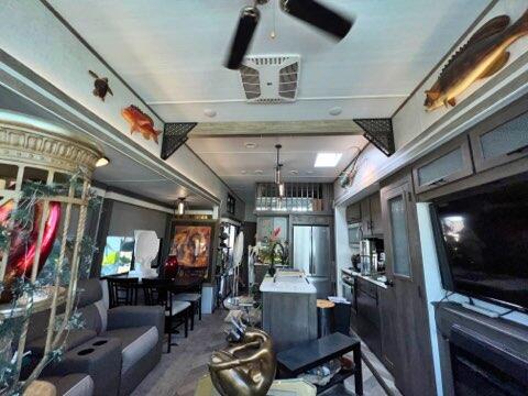 325 Calusa Street, Unit 475 Key Largo, FL 33037 - Photo 6 of 28 a view of a room with lots of furniture and lots of wooden floor