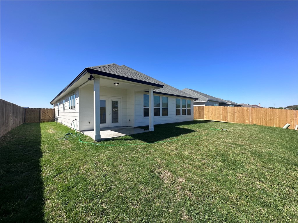 6506 Sam Houston Street Corpus Christi, TX 78414 - Photo 25 of 26 a view of a house with a yard