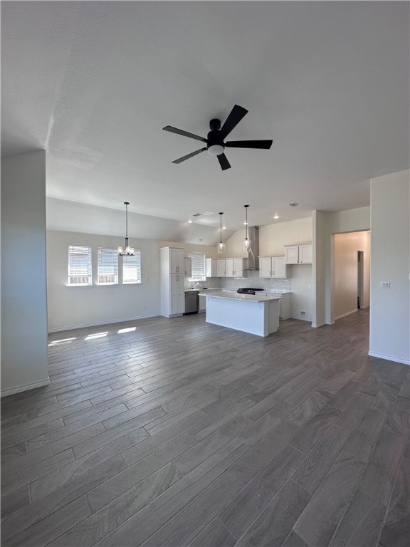 6506 Sam Houston Street Corpus Christi, TX 78414 - Photo 6 of 26 a view of empty room with wooden floor and window