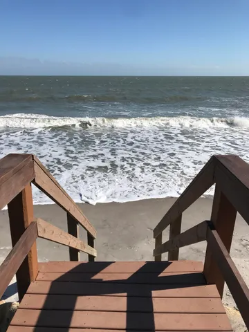 a view of ocean from a balcony