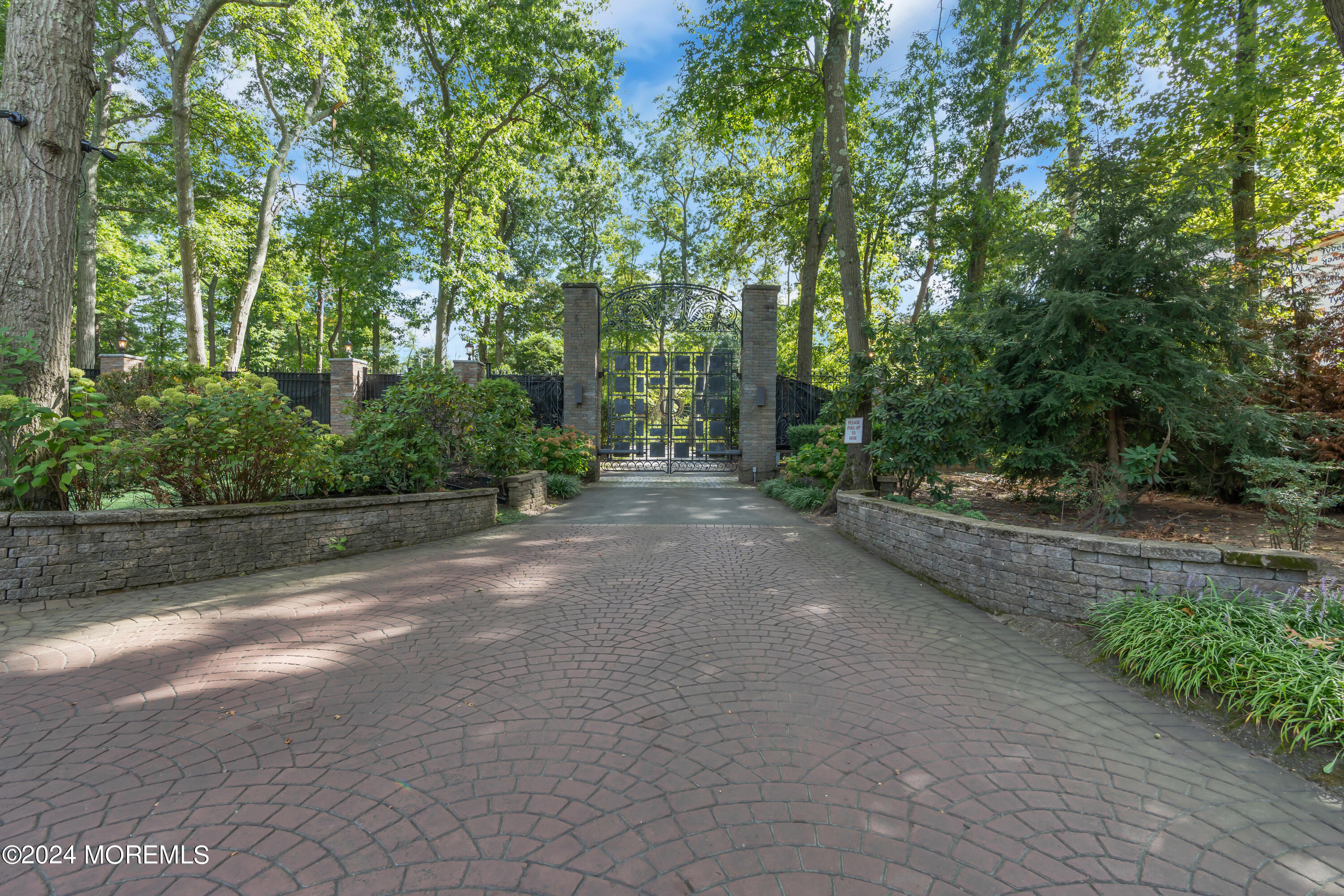 211 State Route 33 Freehold, NJ 07728 - Photo 3 of 64 a view of a street with trees and bushes