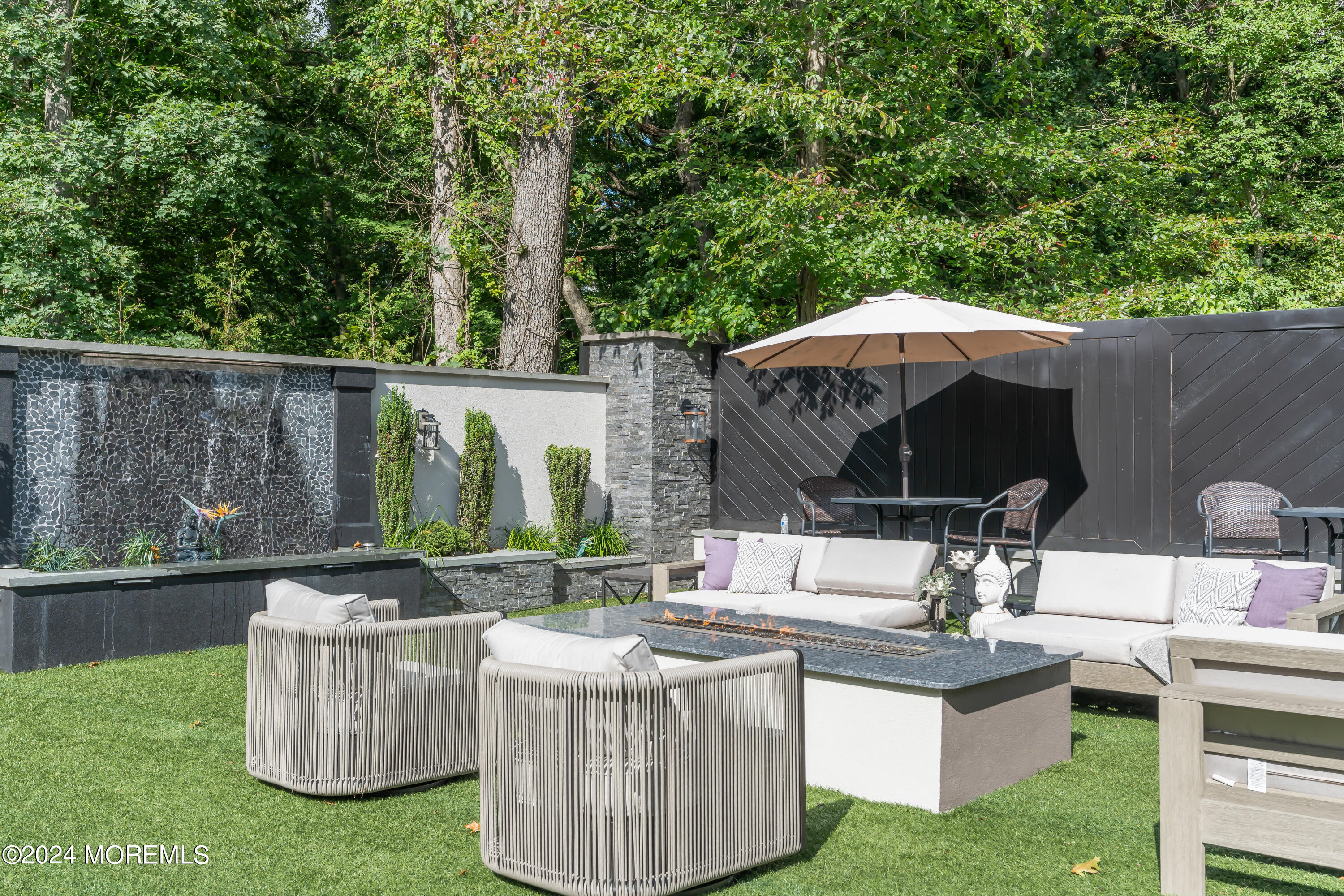 211 State Route 33 Freehold, NJ 07728 - Photo 48 of 64 a view of a table and chairs in the patio