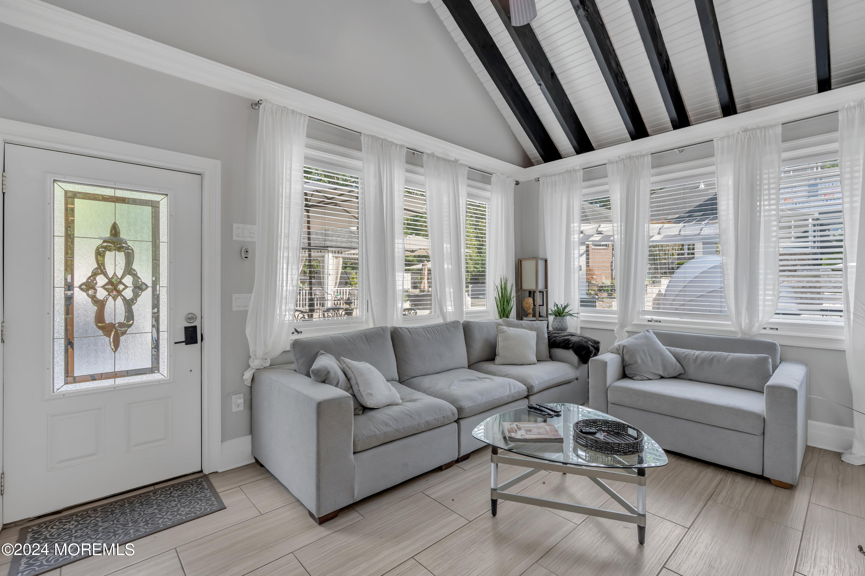 211 State Route 33 Freehold, NJ 07728 - Photo 50 of 64 a living room with furniture and a large window