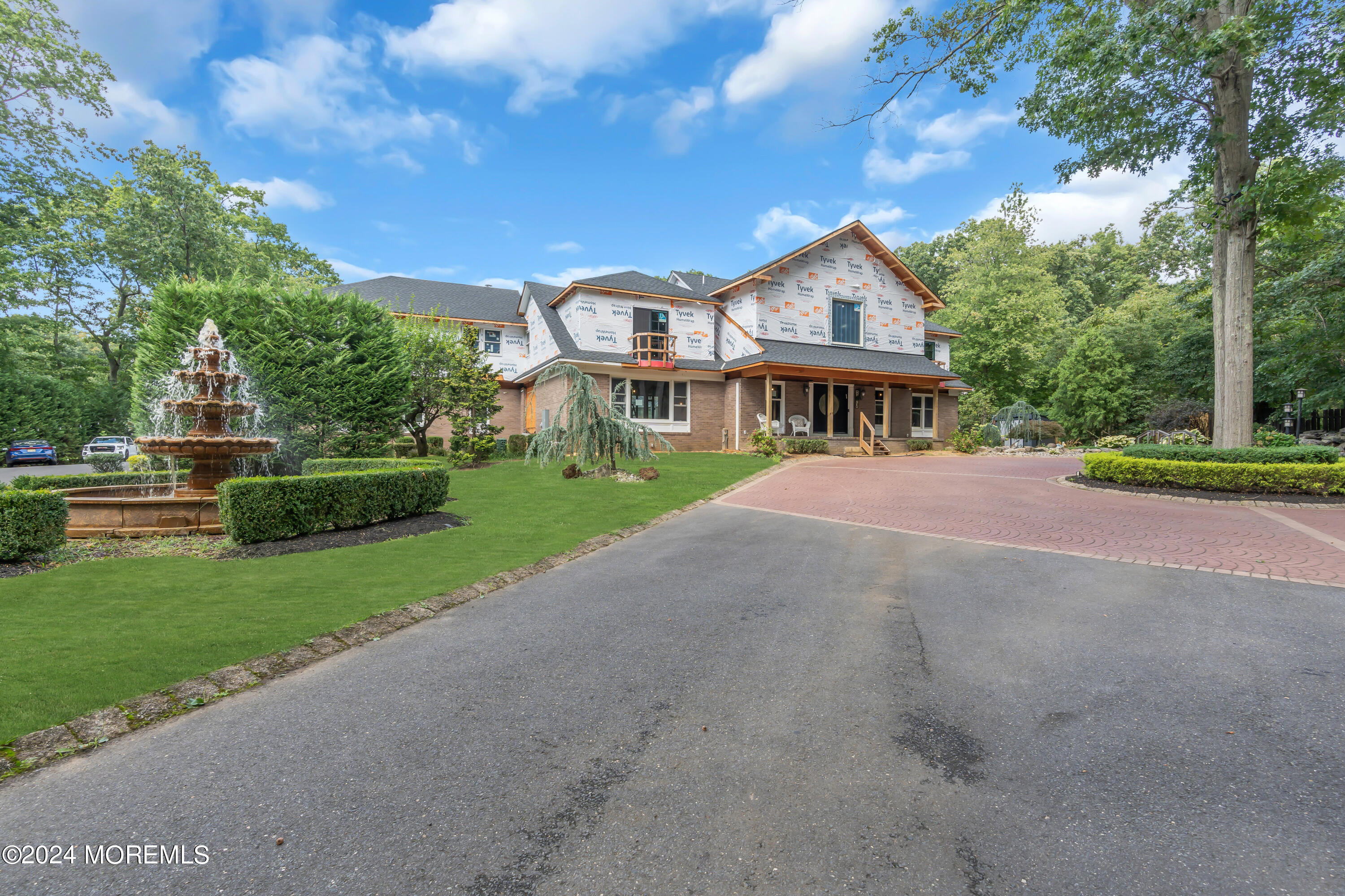 211 State Route 33 Freehold, NJ 07728 - Photo 5 of 64 a view of house with outdoor space and street view