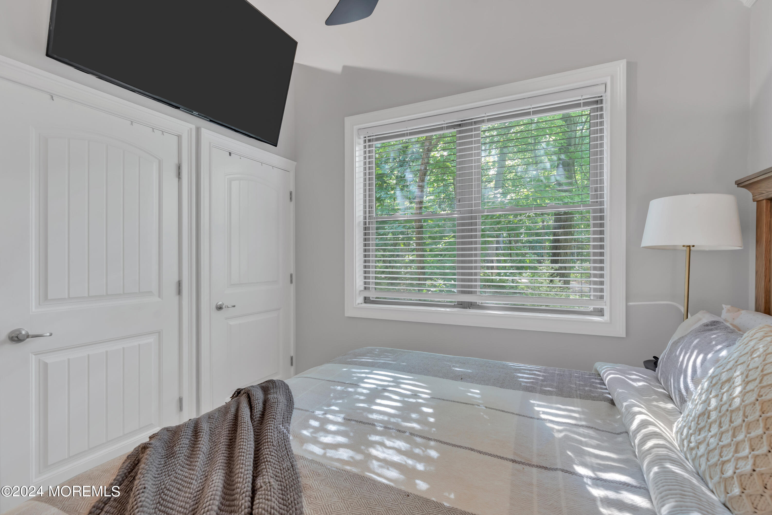 211 State Route 33 Freehold, NJ 07728 - Photo 56 of 64 a view of a bedroom with a bed and a window