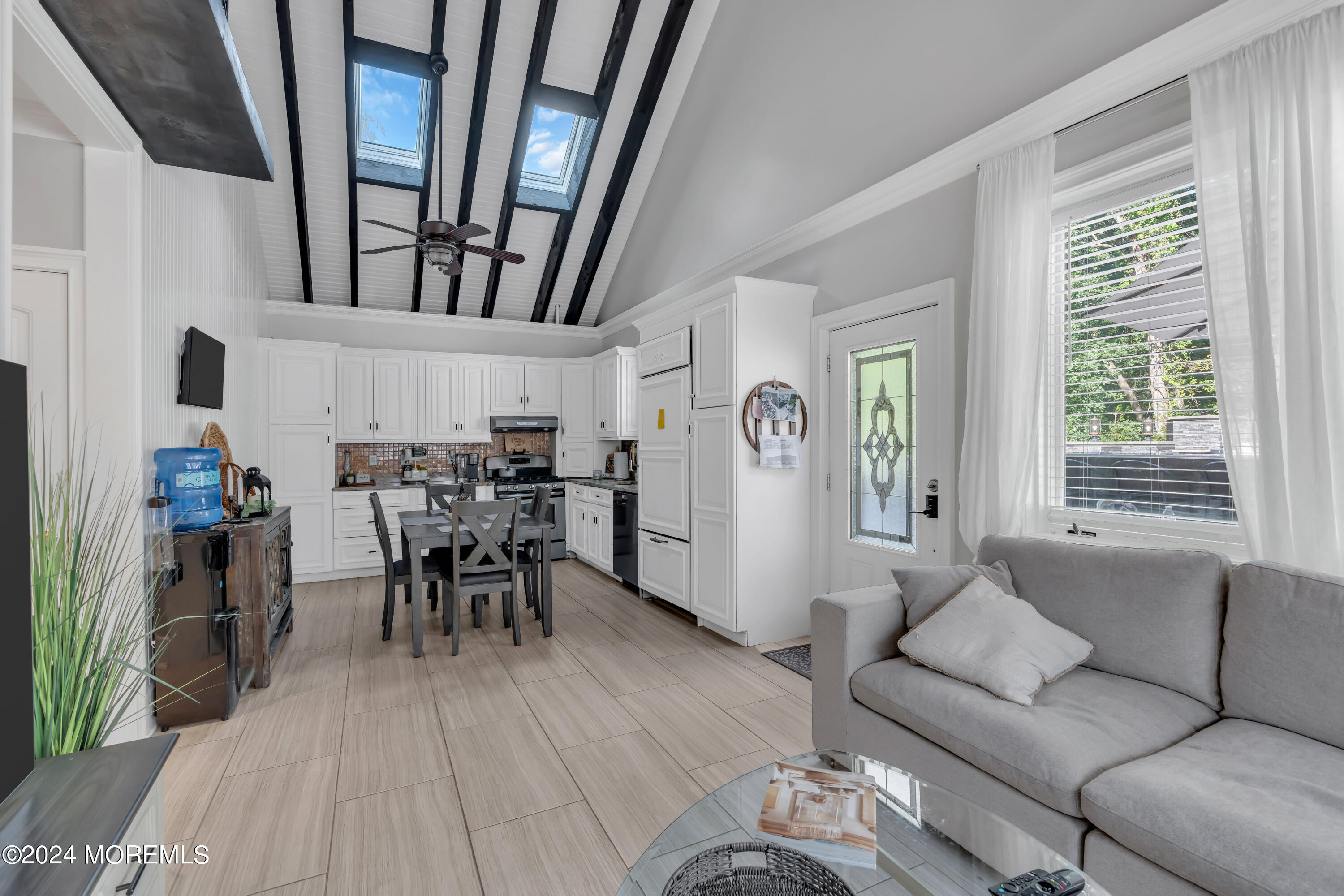 211 State Route 33 Freehold, NJ 07728 - Photo 58 of 64 a living room with furniture and a wooden floor