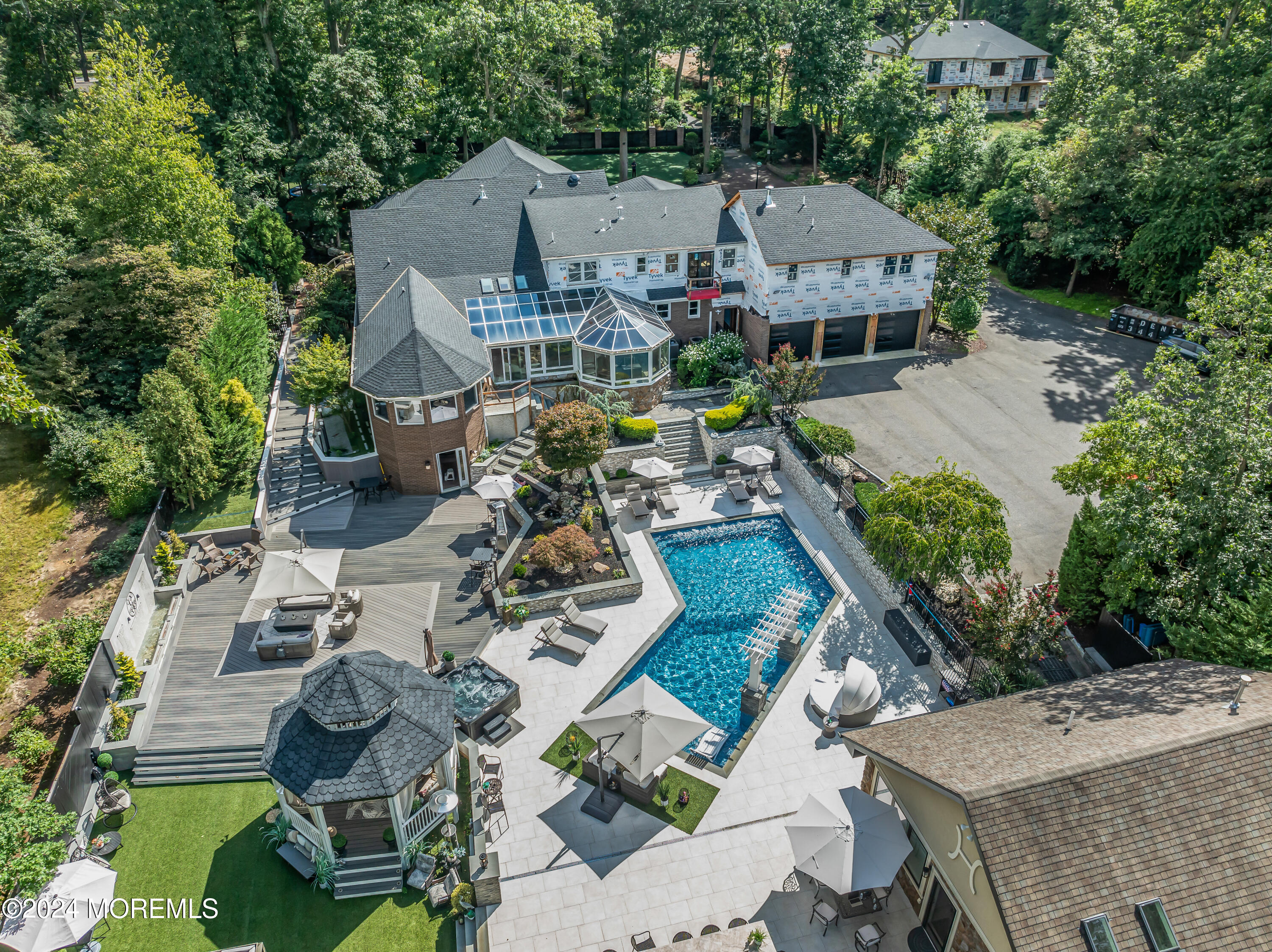 211 State Route 33 Freehold, NJ 07728 - Photo 64 of 64 an aerial view of a house with swimming pool and garden