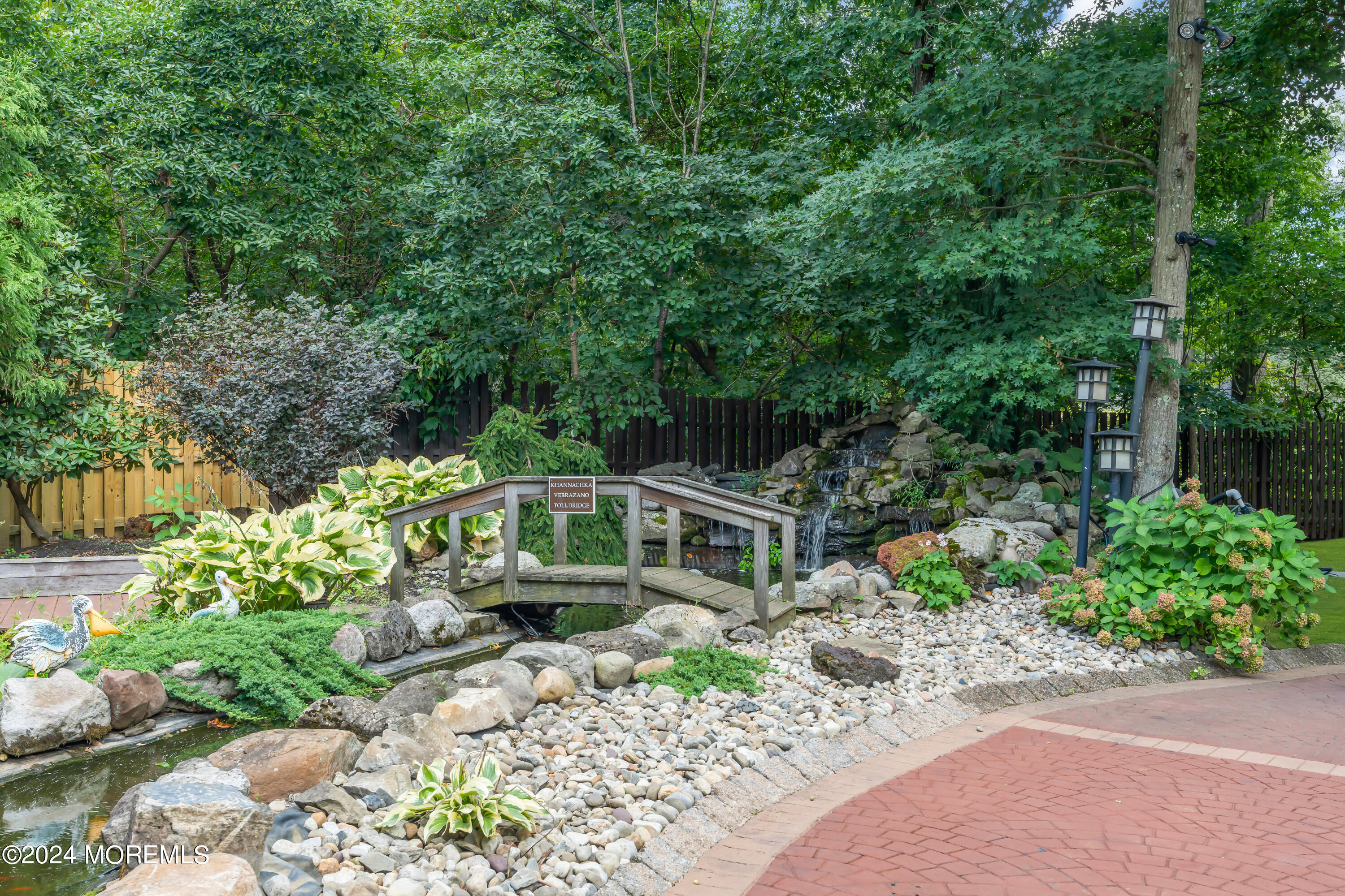 211 State Route 33 Freehold, NJ 07728 - Photo 9 of 64 a front view of a house with a yard