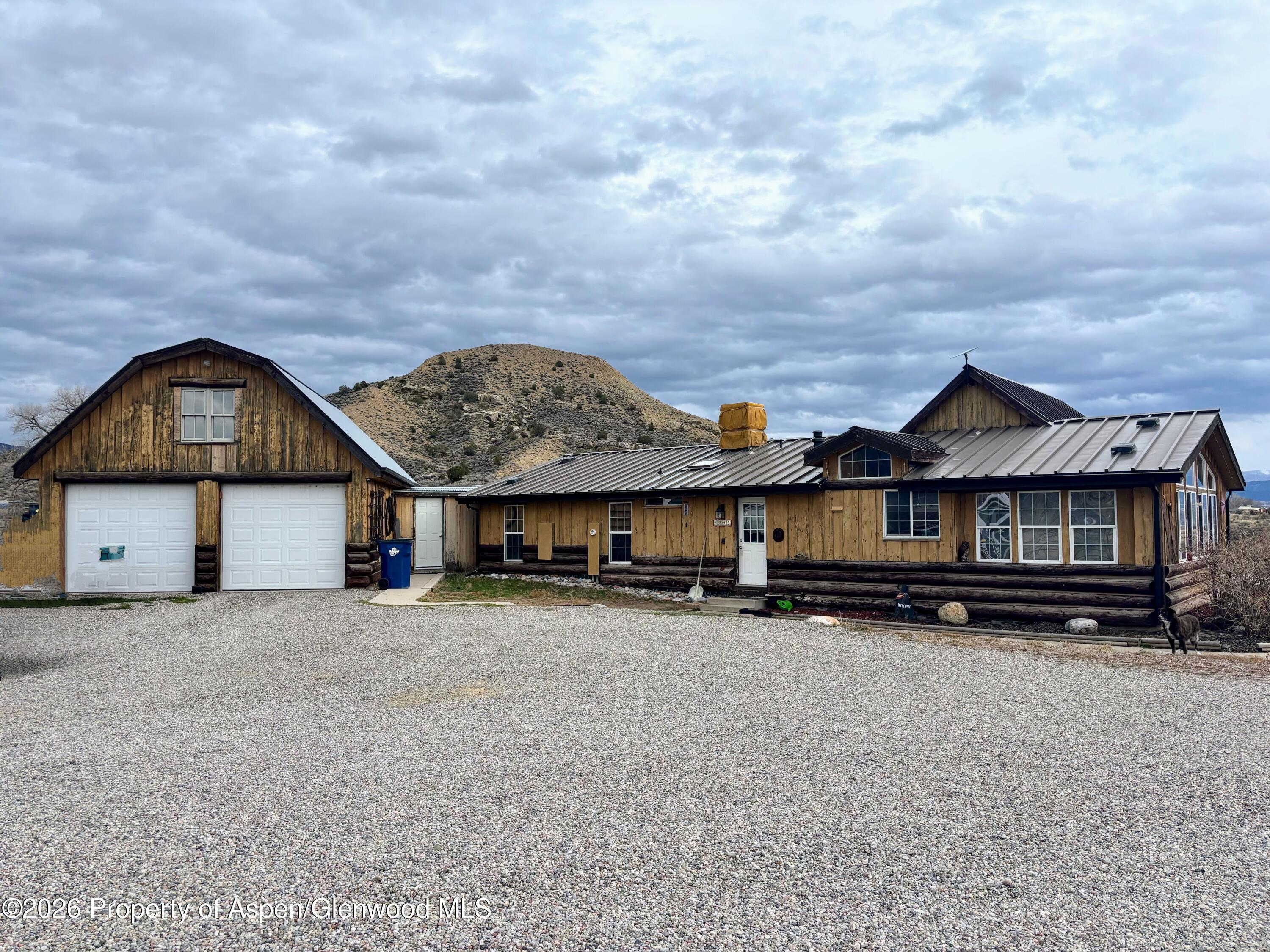 4849 County Road 233 Rifle, CO 81650 - Photo 2 of 6 Exterior with Garage
