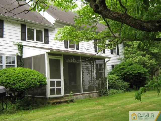 1267 Old York Road Robbinsville, NJ 08691 - Photo 3 of 6 a view of a house with a yard